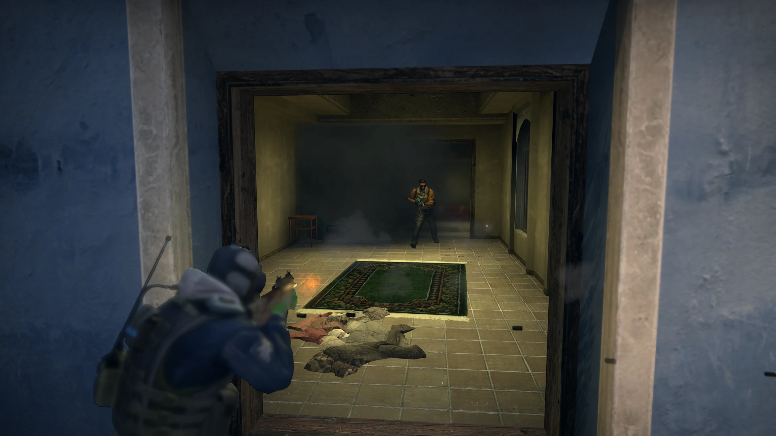 A defender fires into a room at an attacker on Mirage